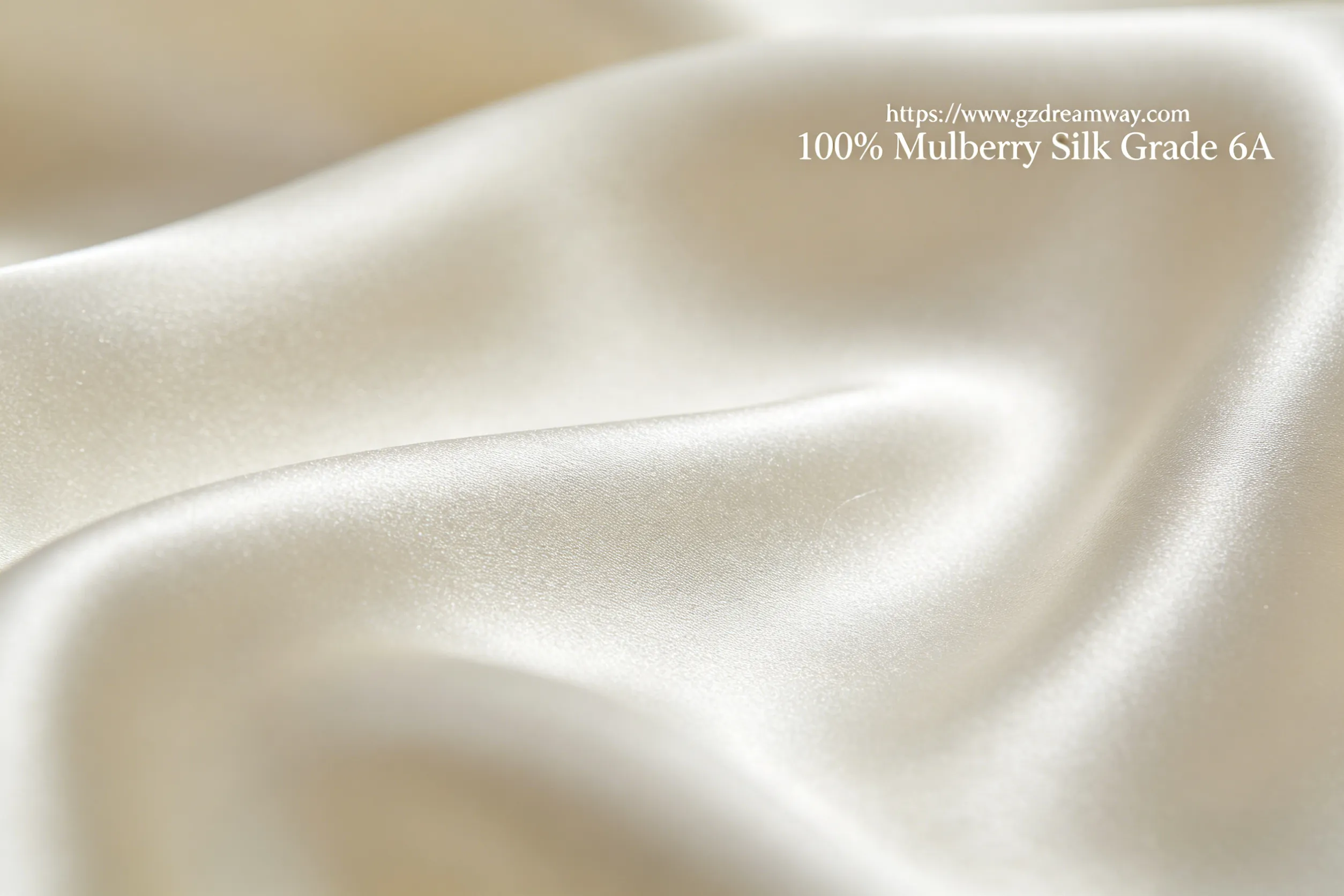 Extreme macro photography showing the ivory surface of 22mm mulberry silk — pearl-like fiber texture visible