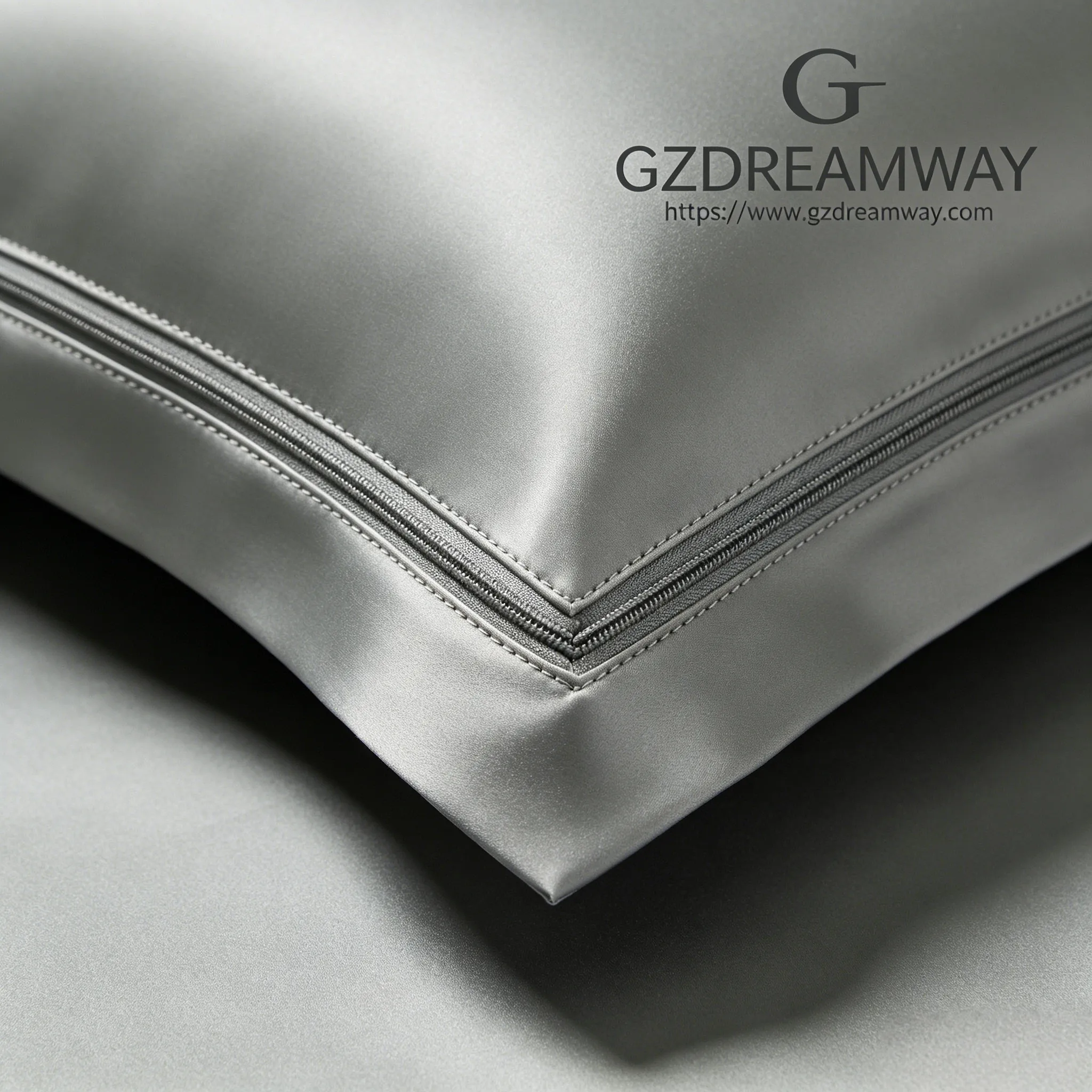 Extreme macro photography showing perfect 5 stitches per cm on slate gray silk pillowcase hidden zipper