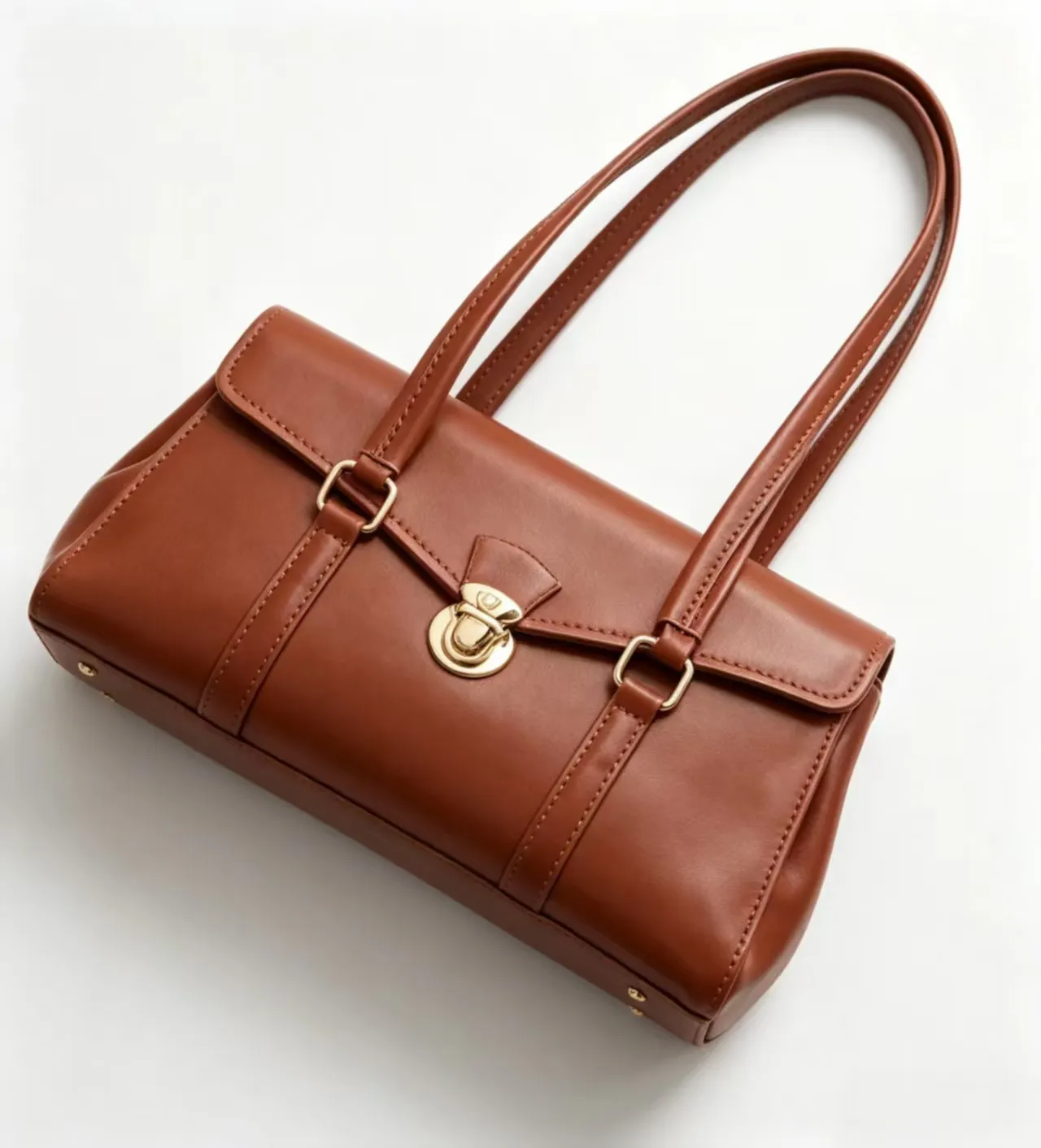 Genuine leather tote bag angled view — TB-2411062 tilted position showing side profile and craftsmanship